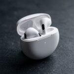 Wireless_earbuds_in_charging_case_20261017191408