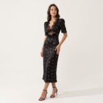 Woman_posing_in_floral_dress_20261019214913