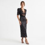 Woman_posing_in_floral_dress_20261019214931