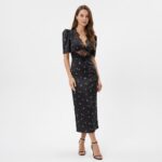 Woman_posing_in_floral_dress_20261019214938