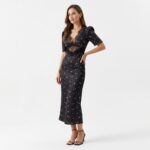 Woman_posing_in_floral_dress_20261019214944