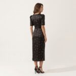 Woman_wearing_black_floral_dress_20261019215225
